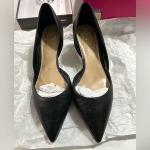 Black heeled pumps